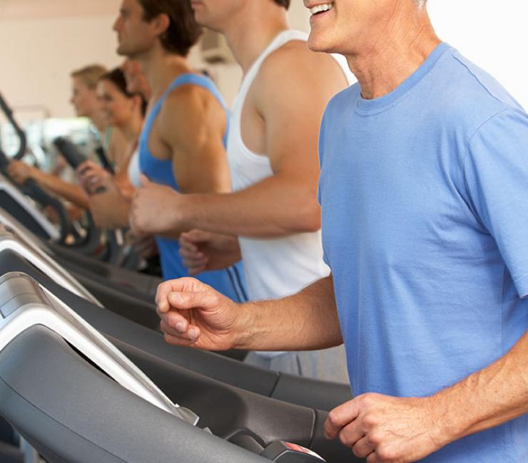 adults working out at the fitness center at The Lodge at Torrey Pines