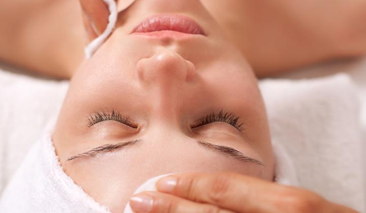 Woman having a facial at the spa