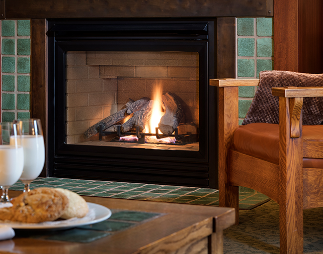 Milk and cookies in front of the fireplace in a Palisade Room