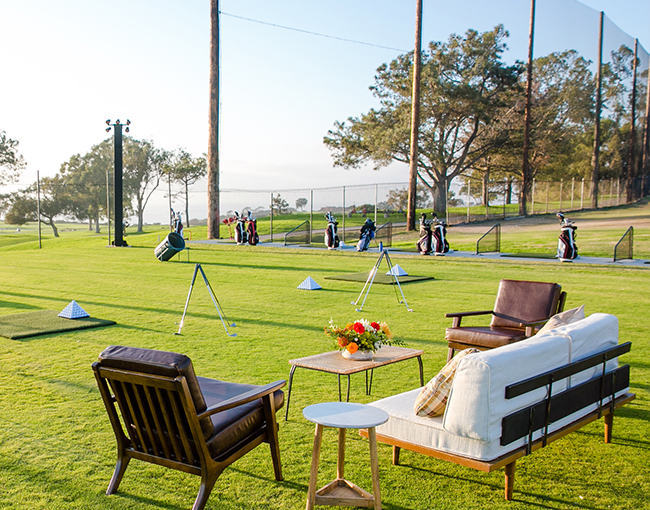 Seating area overlooking driving range Sip n Swing