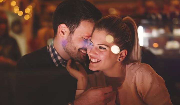 Romantic Couple sharing a meal