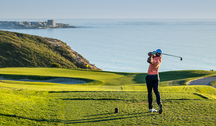 Golfer driving on the golf course at Torrey Pines Reserve