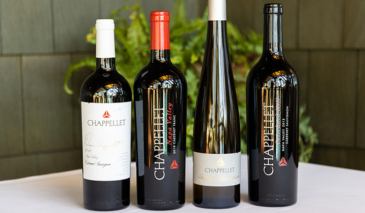 Four bottles of wine from Chappellet Winery being featured at the Artisan Table Wine Dinner at A.R. Valentien at The Lodge at Torrey Pines in La Jolla, CA.