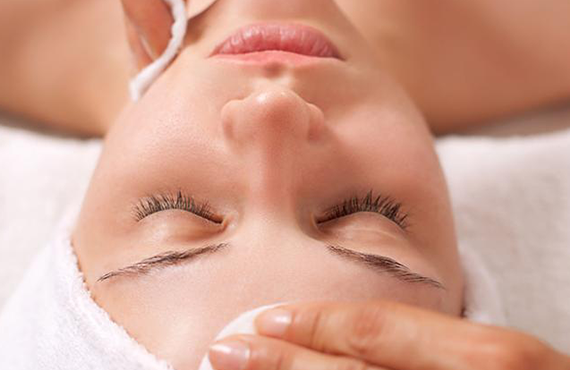 Woman having a facial at the spa