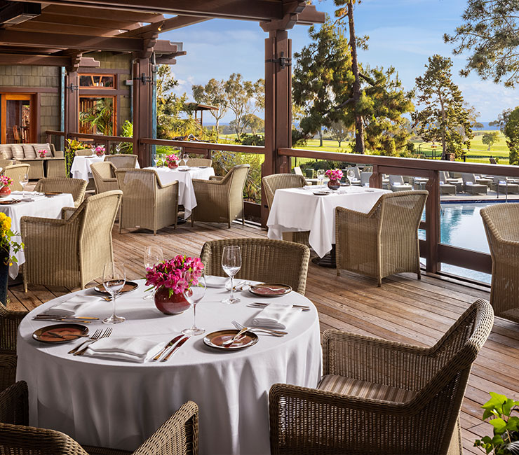 Exquisite dining setup overlooking the pool at the Lodge at Torrey Pines in La Jolla, CA.
