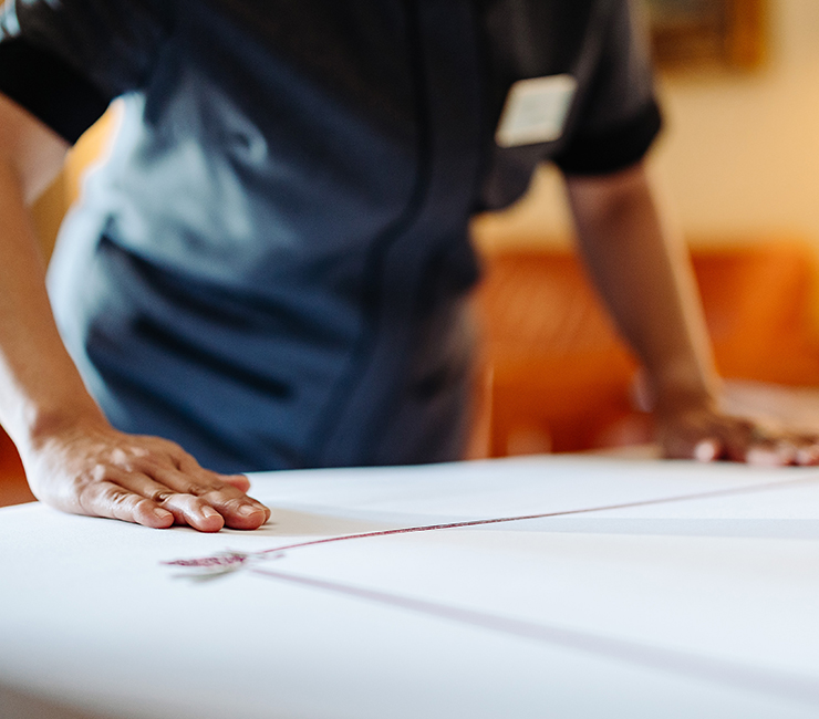  Staff preparing the rooms for guests with turndown service at The Lodge at Torrey Pines.