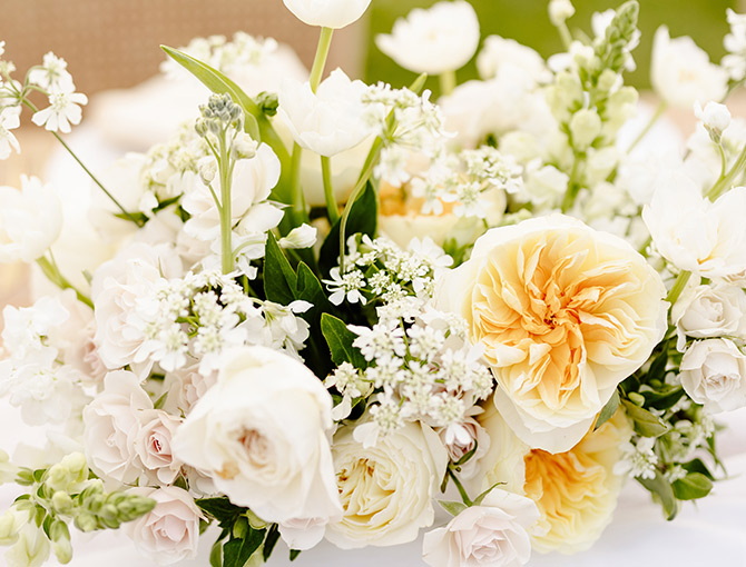 Place setting with flowers, part of the Reserve Collection wedding package at The Lodge at Torrey Pines.