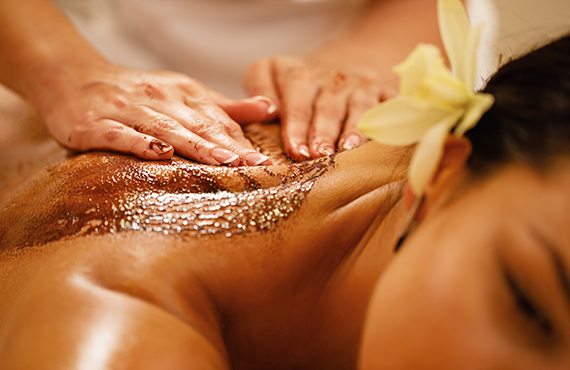 Woman enjoying a body scrub